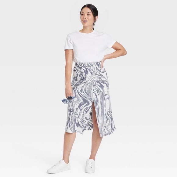 a new day Dresses & Skirts - Ruched Satin Midi Slip
Skirt - White/Blue Swirl
NWT medium